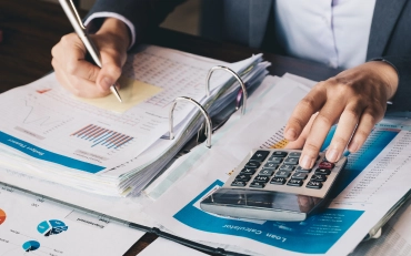 CPA professional reviewing financial document for Individual tax preparation services in Billings, Montana