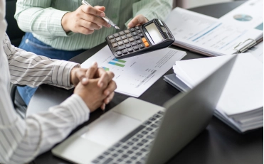 Two Certified accountants performing financial analysis for bookkeeping services in Billings, Montana