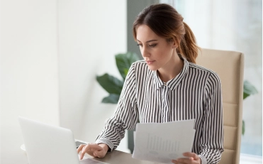 CPA professional analyzing financial data representing Small business accounting services in Billings, Montana