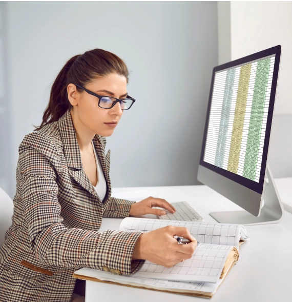 Female Bookkeeper viewing records, representing bookkeeping services in Billings, Montana