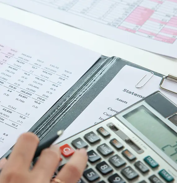 CPA professional reviewing Accounting-related files representing Tax and Accounting Services in Billings, Montana